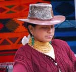 Latina woman with hat and bright sweater