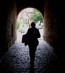 Person walking through a tunnel